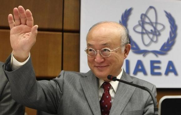 International Atomic Energy Agency (IAEA) Director General Yukiya Amano waves as he arrives for a board of governors meeting at the IAEA headquarters in Vienna June 4, 2014. CREDIT: REUTERS/HEINZ-PETER BADER