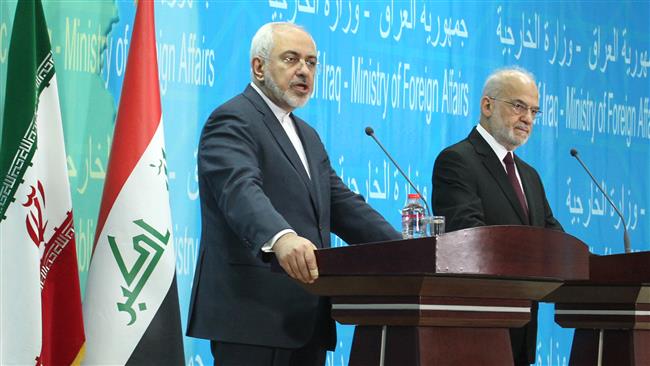 Iranian Foreign Minister Mohammad Javad Zarif (L) speaks during a press conference with Iraqi Foreign Minister Ibrahim al-Jaafari in the Iraqi capital Baghdad on February 24, 2015. (©AFP)
