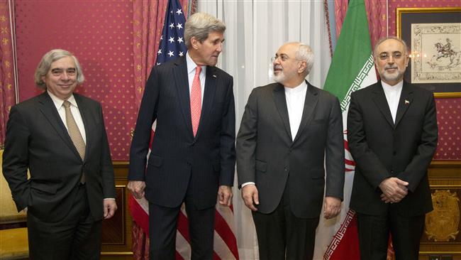 Iranian Foreign Minister Mohammad Javad Zarif (2nd R) seen along with US Secretary of State John Kerry (2nd L), Head of the Atomic Energy Organization of Iran (AEOI) Ali Akbar Salehi (1st R) and US Energy Secretary Ernest Moniz (AFP photo)