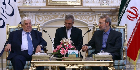 Larijani meeting Walid al-Moallem