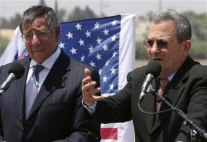 Israeli Defense Minister Ehud Barak (R) and U.S. Defense Secretary Leon Panetta speak to the media at a joint news conference while visiting the Iron Dome defense system launch site in Ashkelon August 1, 2012. REUTERS/Mark Wilson/Pool