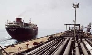 Oil tanker leaving dock