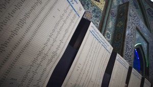 Name lists of parliamentary election candidates are seen at a polling station in central Tehran