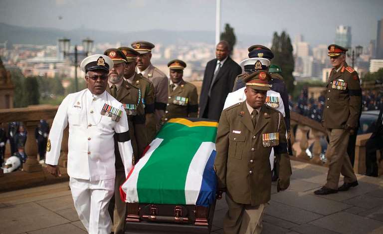 Photos: Mandela's funeral cortège makes solemn journey through Pretoria