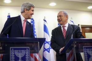 U.S. Secretary of State John Kerry (L) and Israeli Prime Minister Benjamin Netanyahu address a joint news conference at the Prime Minister's Office in Jerusalem, December 5, 2013. REUTERS/Pablo Martinez Monsivais/Pool