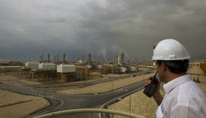  An engineer speaks on his radio at the Phase 4 and Phase 5 gas refineries in Assalouyeh, 1,000 km (621 miles) south of Tehran, January 27, 2011.  REUTERS/Caren Firouz (IRAN - Tags: ENERGY BUSINESS) - RTXX5WC