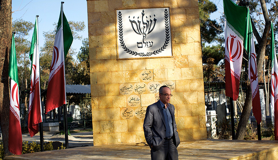 Homayoun Sameyah Najaf Abadi, head of Iran's 8,500-strong Jewish community, poses in front of a new memorial for Iran's Jewish people at the Beheshtieh Jewish cemetery in southern Tehran, Jan. 9, 2015. (photo by Getty Images/Behrouz Mehri)