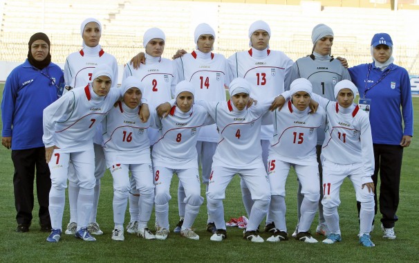 Iran women's national football team headed to Taiwan to participate in qualifying games of Rio 2016 Olympics on March 18, 2015.