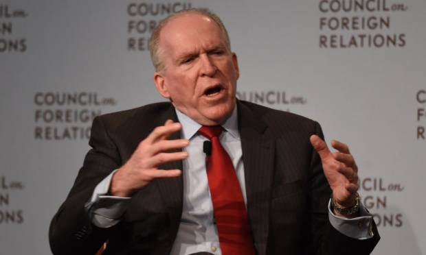  CIA director John Brennan: ‘We work closely with the Iraqi government. The Iranians work closely with the Iraqi government as well.’ Photograph: Don Emmert/AFP/Getty Images