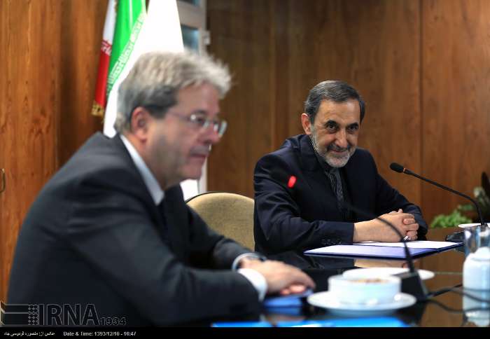 Senior Iranian official Ali Akbar Velayati (R) and Italy’s Foreign Minister Paolo Gentiloni meet in Tehran on March 1, 2015.