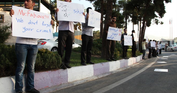 A group of students gather to protest against Fabius visit to Iran