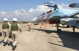 The crew of a Russian Su-30 fighter prepare to take off at Hmeimim aerodrome in Syria. © Dmitriy Vinogradov / RIA Novosti