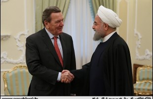 Iran’s President Rouhani meets ex-German chancellor in Tehran