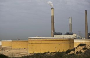 oil storage containers on the shore of the Mediterranean Sea in Israel’s Ashkelo