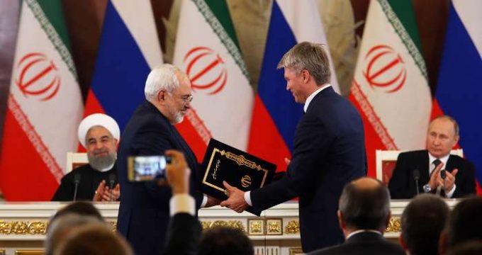 Iran, Russia ink deals as Rouhani visits Moscow