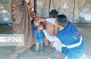 Non-Iranian children receive polio vaccine in Qom