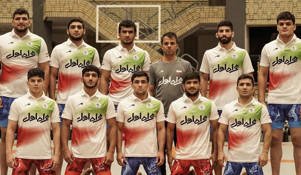 Raisi congratulates winning world title by Iranian wrestlers